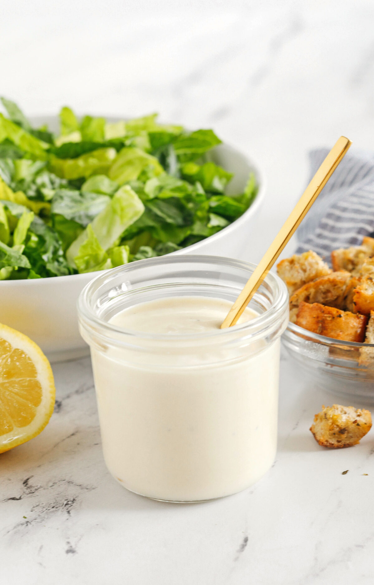 Rich and creamy Healthy Caesar Dressing made with protein-packed Greek yogurt for a lighter take on this classic dressing!  Homemade is always better than store-bought!