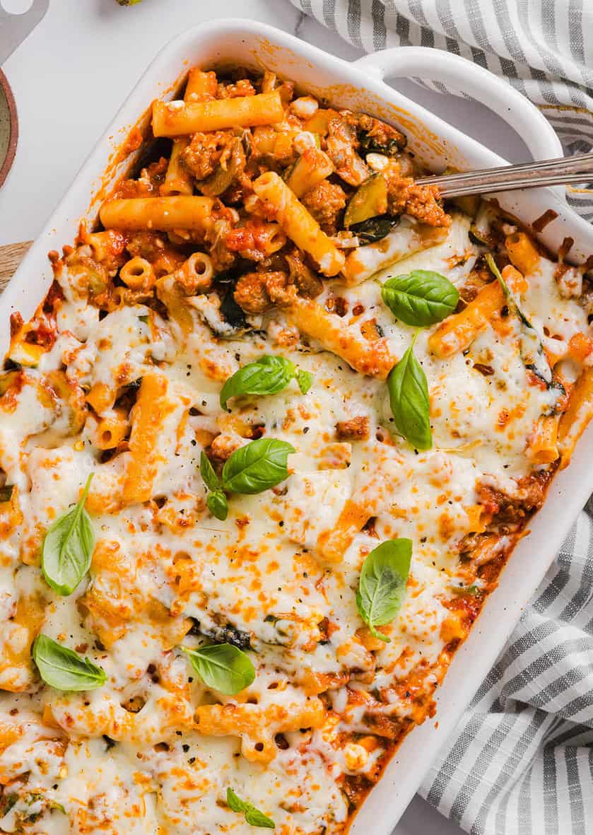 This comforting and delicious Healthy Baked Ziti recipe is packed with fresh veggies, flavorful turkey sausage and makes the perfect weeknight meal the whole family will love! Leftovers are guaranteed!
