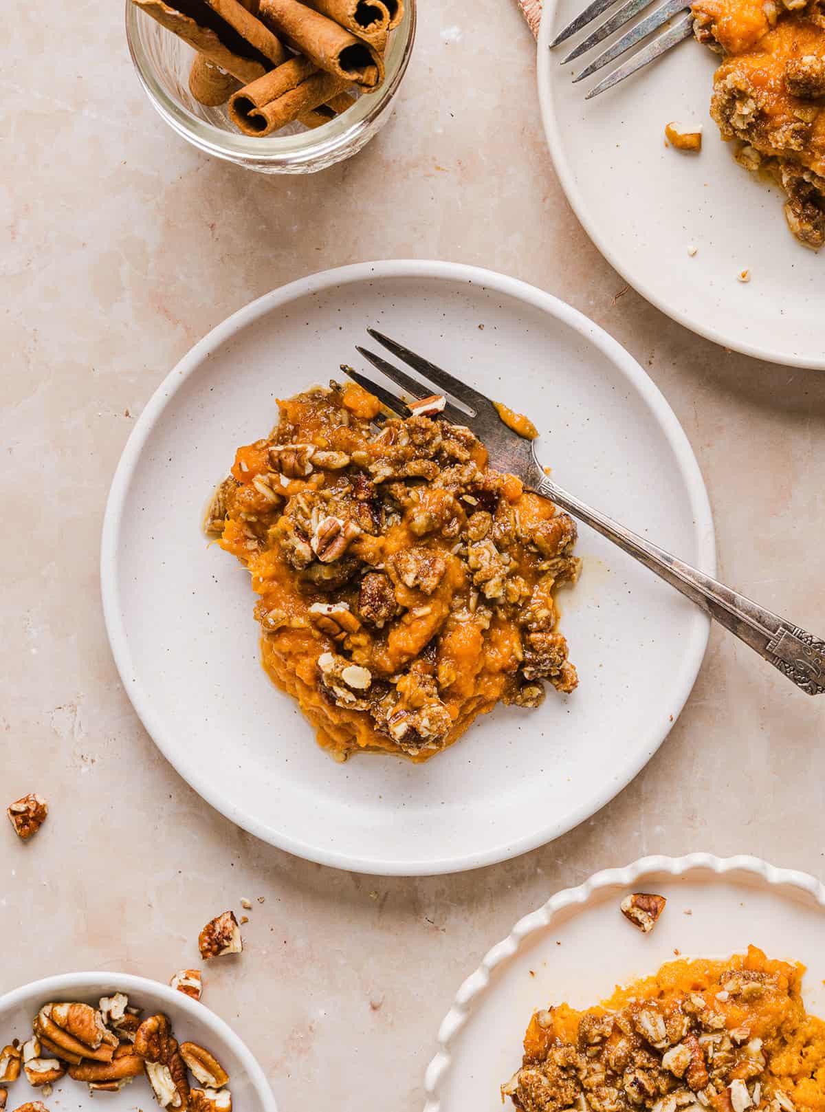 This Healthy Sweet Potato Casserole is a family favorite! A classic holiday side dish that tastes just as delicious as traditional sweet potatoes, but without any refined sugar and a wholesome pecan streusel topping!