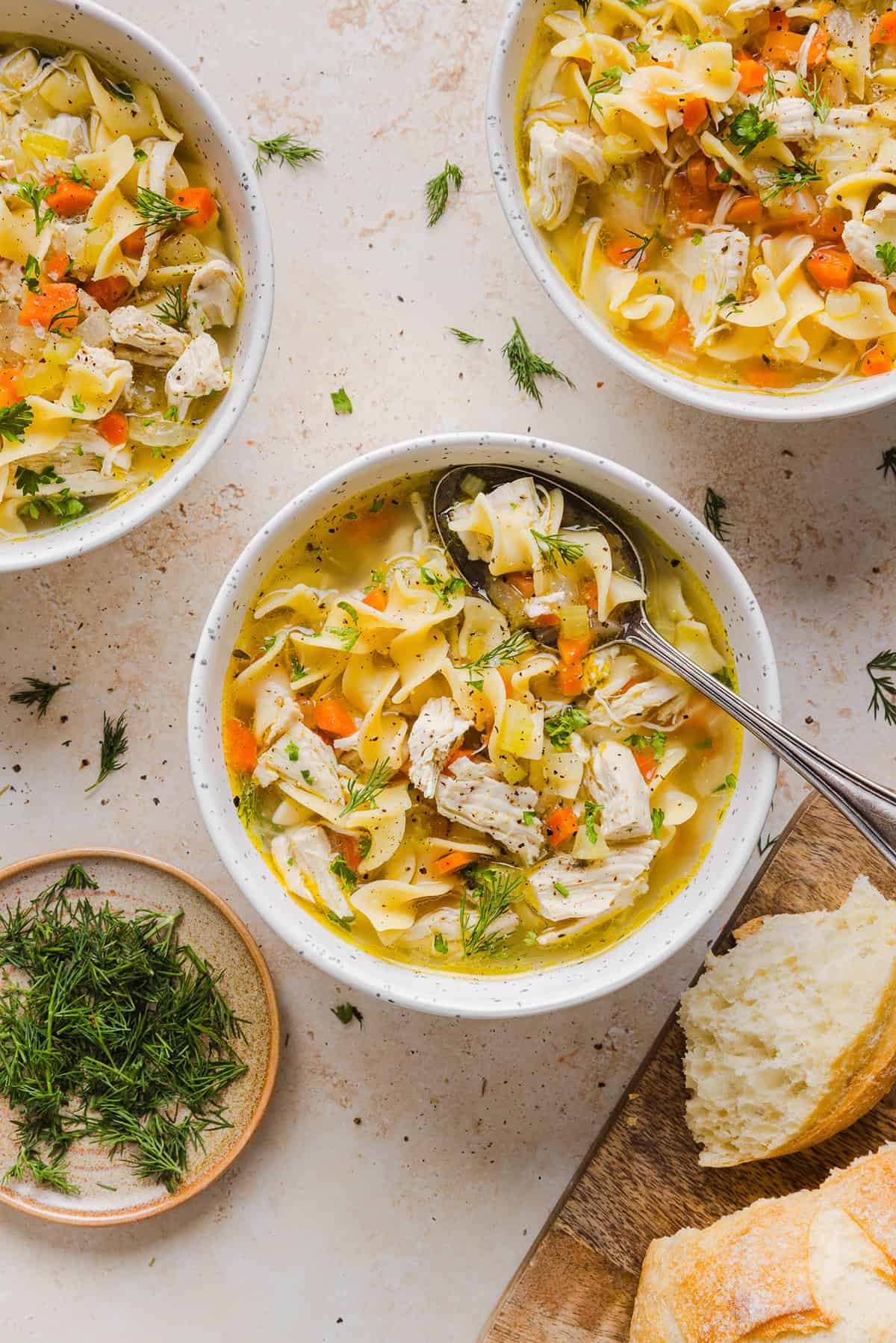 Enjoy a cozy bowl of this Easy Chicken Noodle Soup made with simple ingredients that pack in the flavor! Made with tender chicken, hearty vegetables and a rich, flavorful broth that is comforting and nourishing.