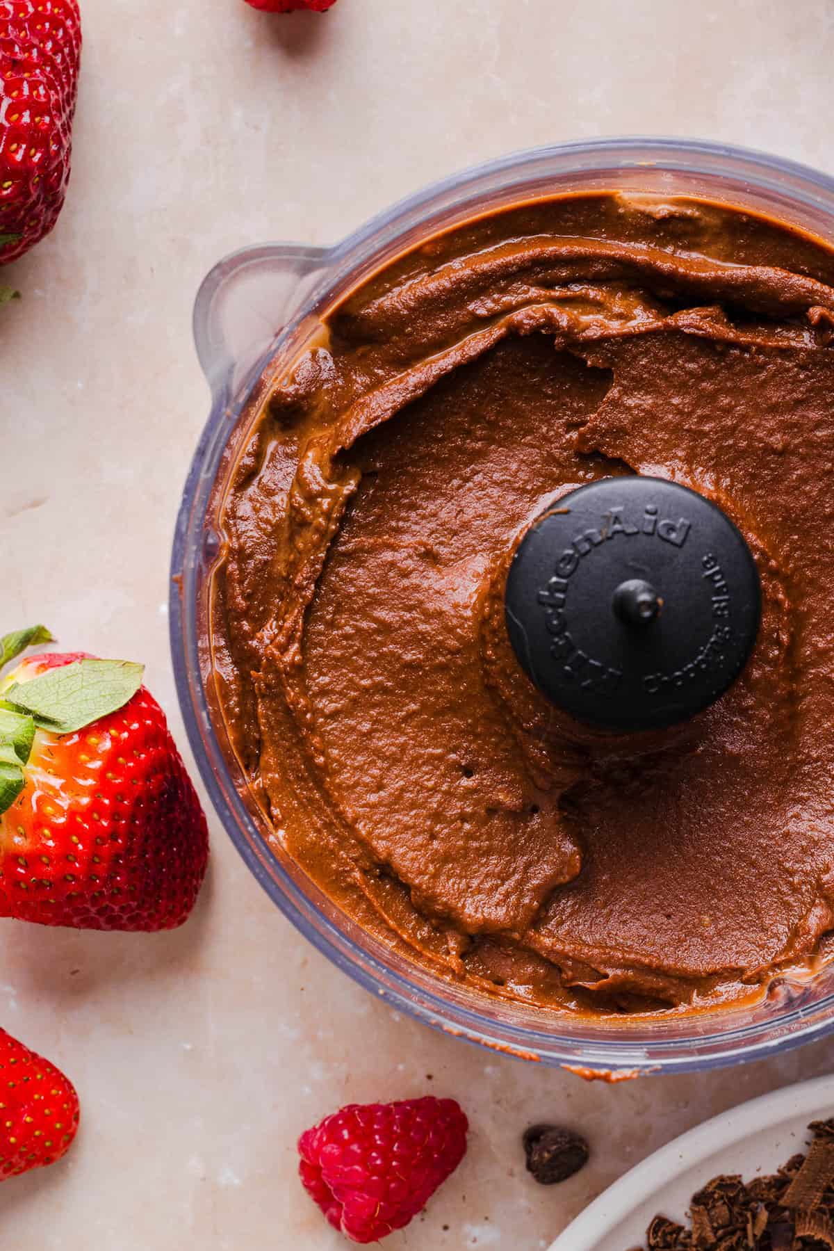 This Healthy Chocolate Hummus is a rich and indulgent way to satisfy your sweet tooth, but made with wholesome ingredients that you can feel good about eating! Serve with your favorite fruit, pretzels or graham crackers for the perfect fun dessert or snack!