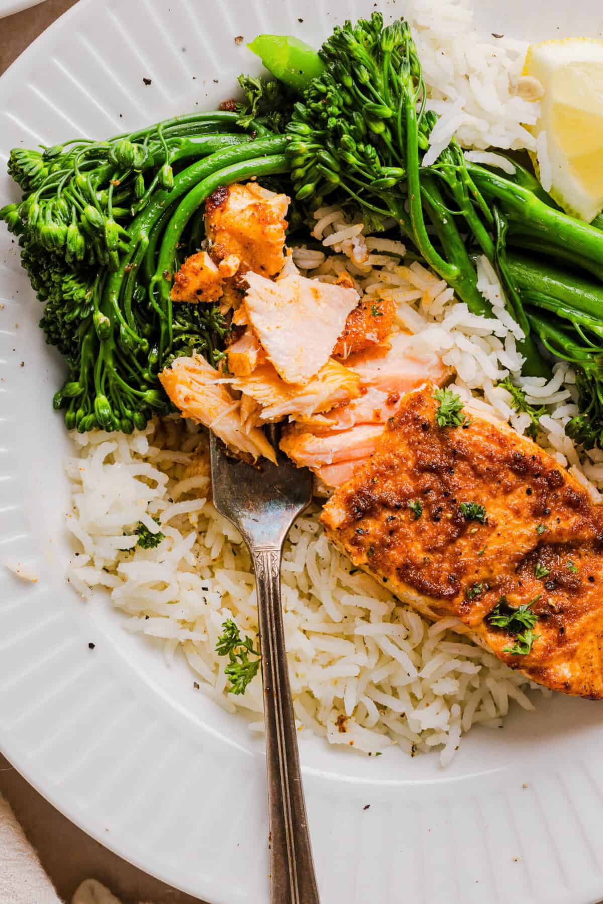 Easy Air Fryer Salmon that turns out perfectly flaky every time in under 10 minutes! Seasoned with a blend of spices for a delicious, healthy meal great for busy weeknights or when you need to meal prep.