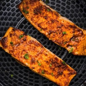 Easy Air Fryer Salmon that turns out perfectly flaky every time in under 10 minutes! Seasoned with a blend of spices for a delicious, healthy meal great for busy weeknights or when you need to meal prep.