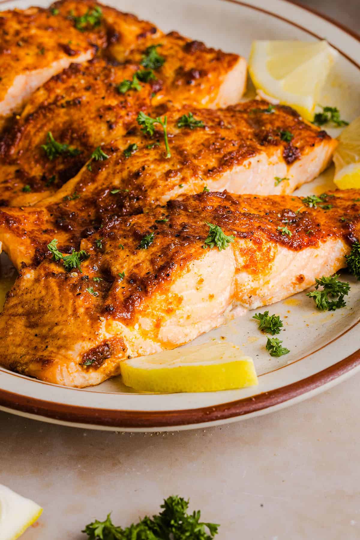 Easy Air Fryer Salmon that turns out perfectly flaky every time in under 10 minutes! Seasoned with a blend of spices for a delicious, healthy meal great for busy weeknights or when you need to meal prep.
