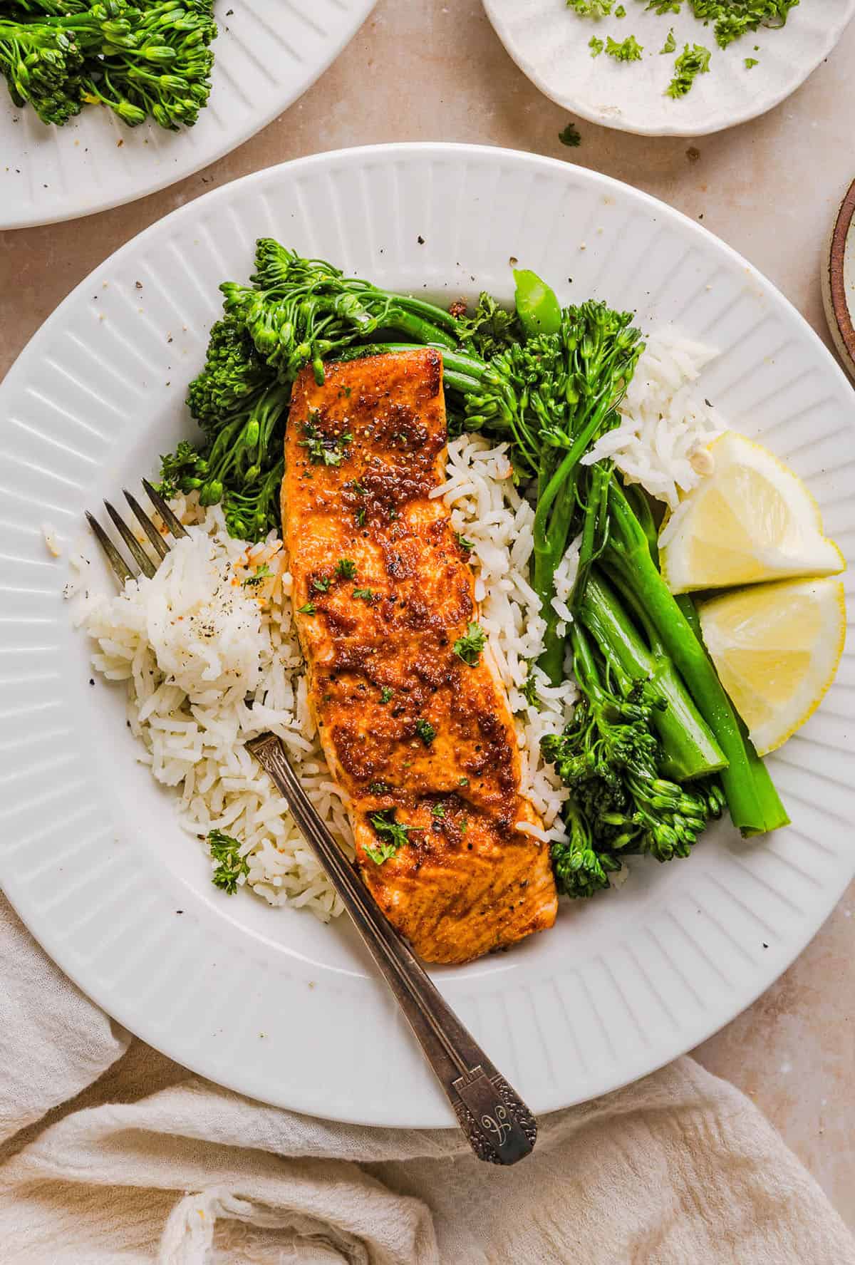 Easy Air Fryer Salmon that turns out perfectly flaky every time in under 10 minutes! Seasoned with a blend of spices for a delicious, healthy meal great for busy weeknights or when you need to meal prep.