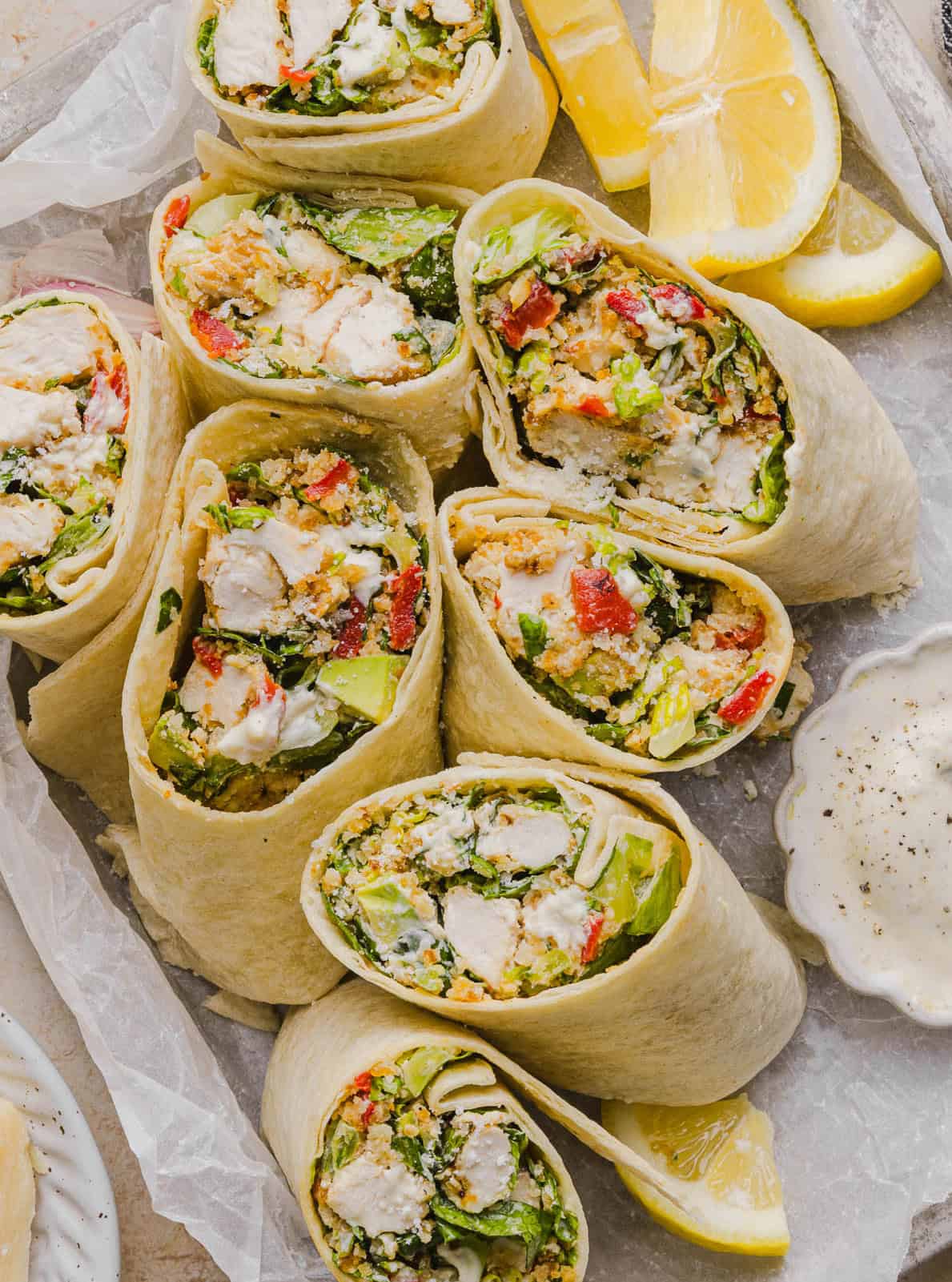 The BEST Healthy Chicken Caesar Wraps made with tender chicken, fresh romaine, a creamy homemade dressing and crispy panko crunch! An easy 20-minute lunch or dinner everyone will love!