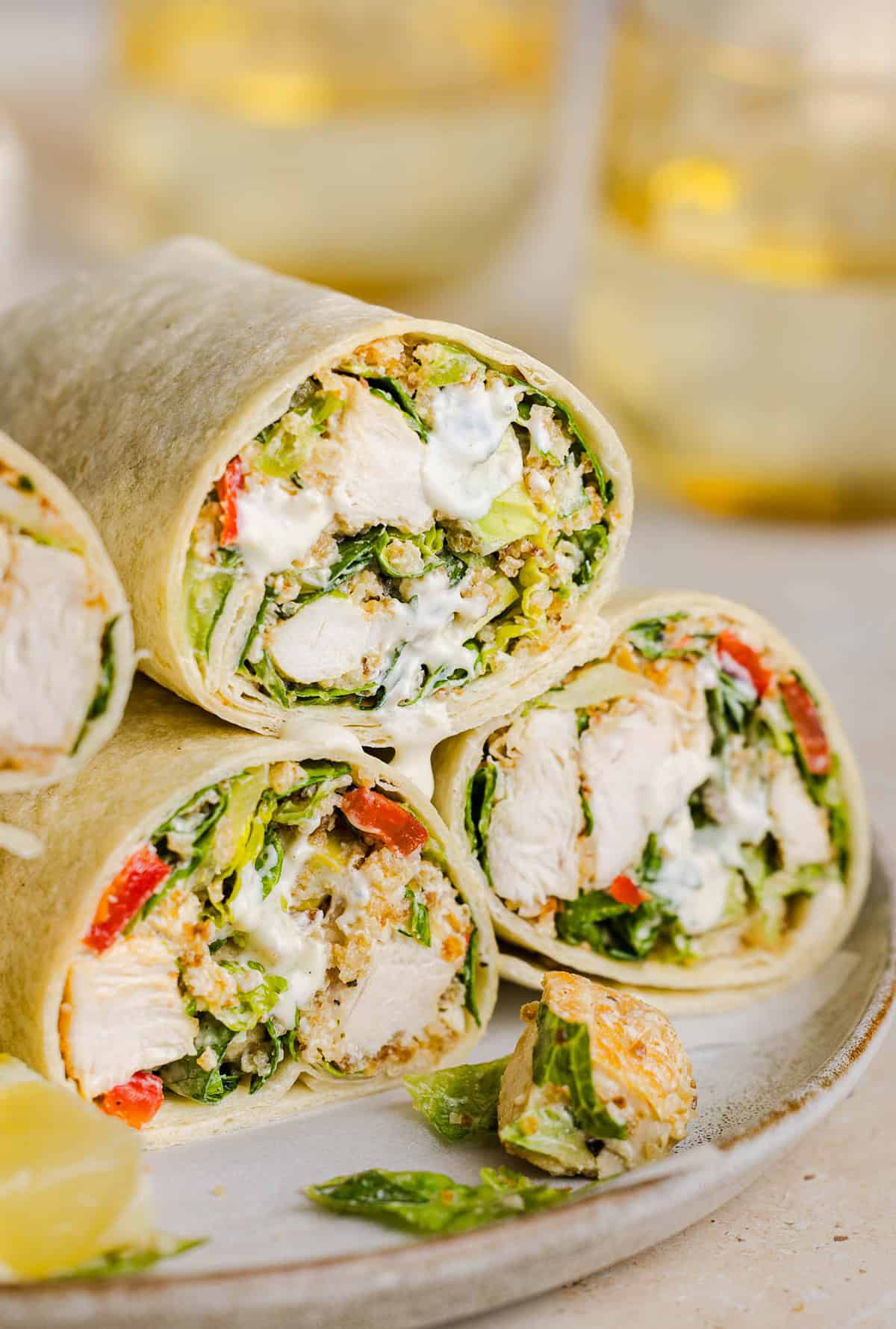 The BEST Healthy Chicken Caesar Wraps made with tender chicken, fresh romaine, a creamy homemade dressing and crispy panko crunch! An easy 20-minute lunch or dinner everyone will love!