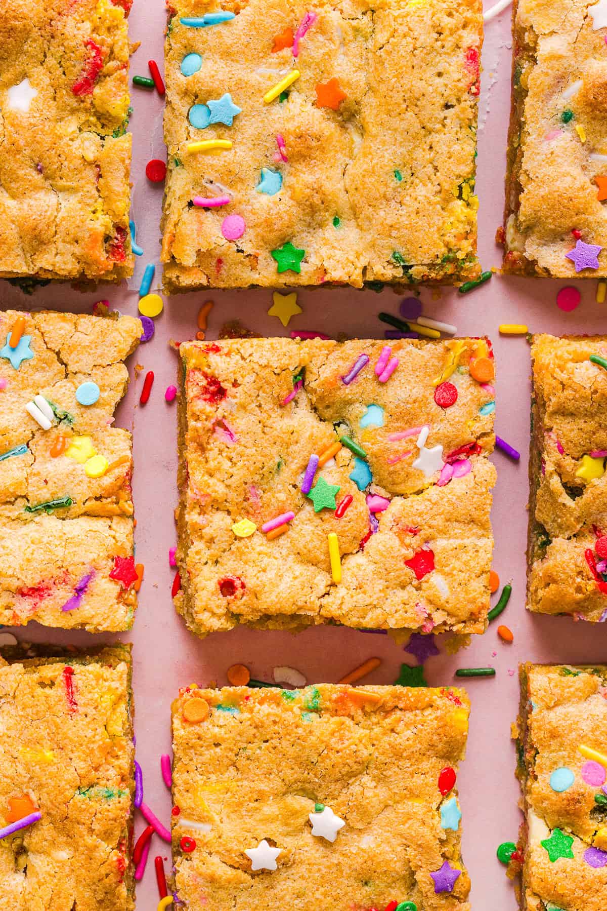 Soft and chewy Healthy Funfetti Cookie Bars that taste like birthday cake batter! Made healthier with whole wheat flour, less butter and zero refined sugar for the perfect lightened-up party dessert!