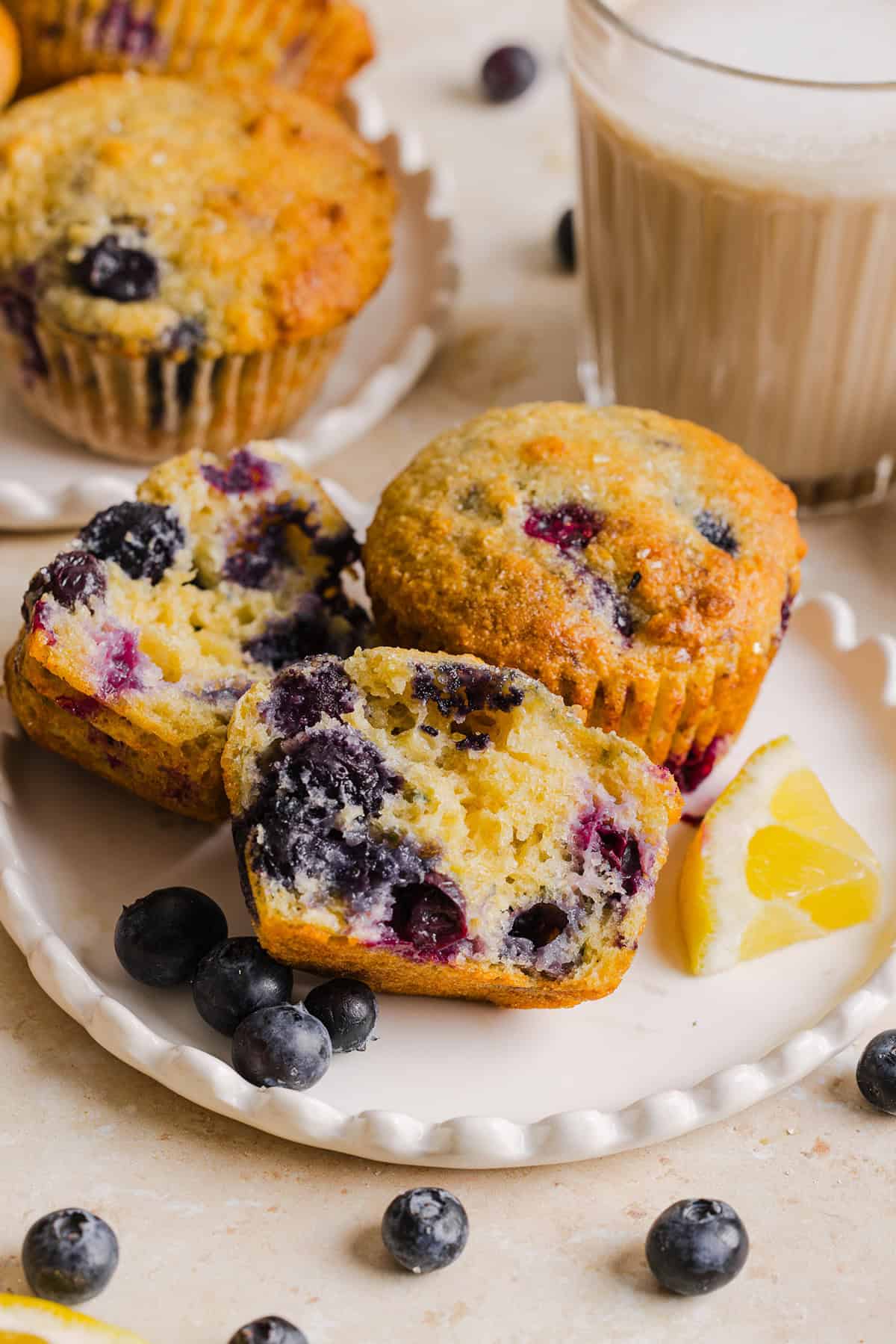 These Lemon Blueberry Yogurt Muffins are soft, moist and bursting with fresh lemon flavor and juicy blueberries! Made with Greek yogurt and wholesome ingredients, they are perfect for breakfast, snacks or meal prep.
