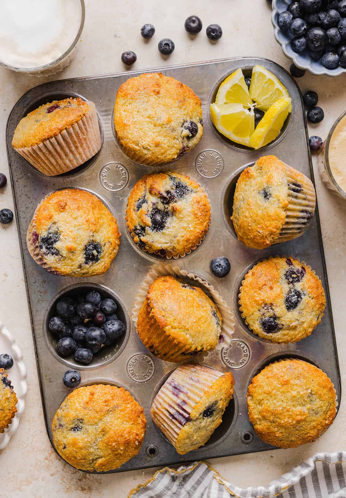 These Lemon Blueberry Yogurt Muffins are soft, moist and bursting with fresh lemon flavor and juicy blueberries! Made with Greek yogurt and wholesome ingredients, they are perfect for breakfast, snacks or meal prep.