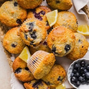 These Lemon Blueberry Yogurt Muffins are soft, moist and bursting with fresh lemon flavor and juicy blueberries! Made with Greek yogurt and wholesome ingredients, they are perfect for breakfast, snacks or meal prep.