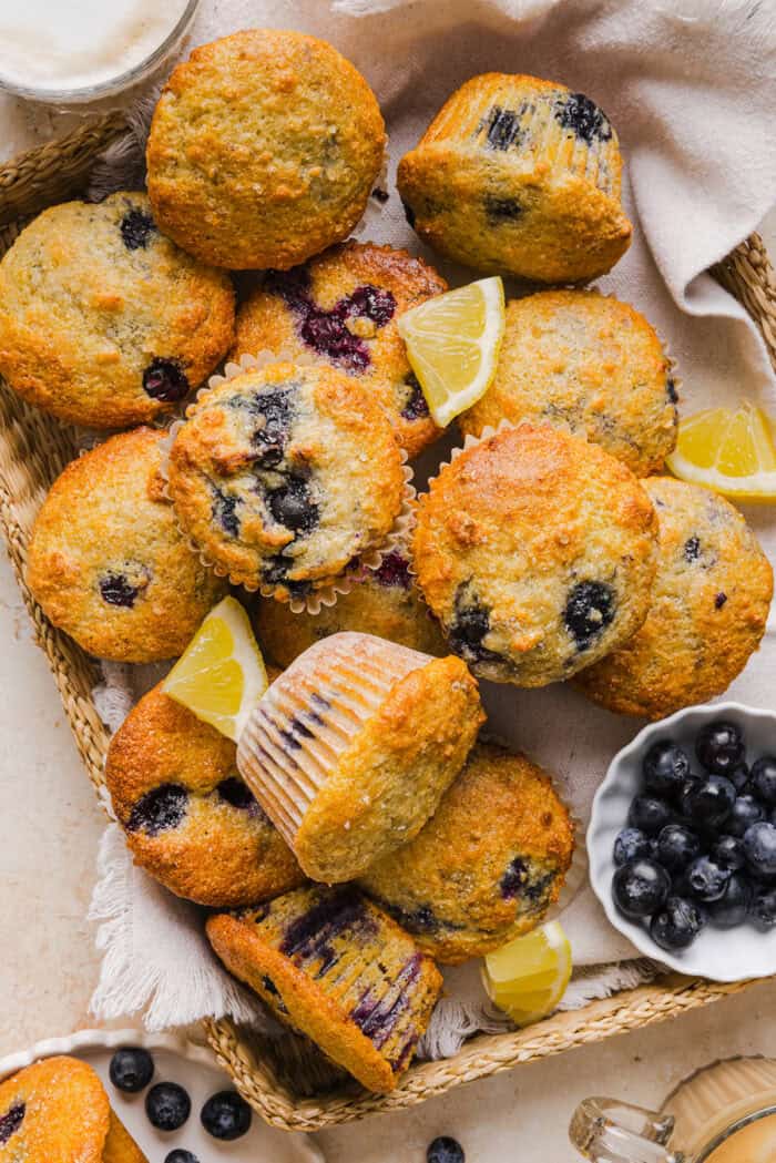 These Lemon Blueberry Yogurt Muffins are soft, moist and bursting with fresh lemon flavor and juicy blueberries! Made with Greek yogurt and wholesome ingredients, they are perfect for breakfast, snacks or meal prep.