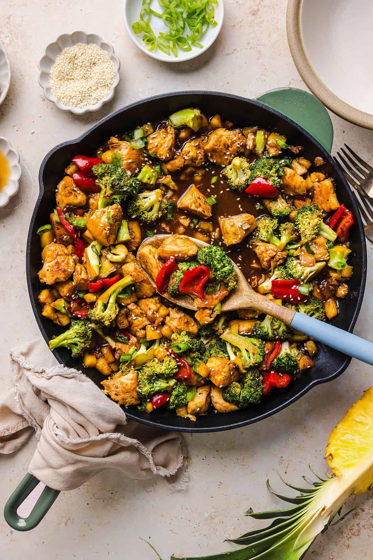 Skip the takeout with this Easy Pineapple Teriyaki Chicken Stir Fry! Made with juicy chicken, fresh pineapple, crisp veggies, and a healthy homemade teriyaki sauce in just 30 minutes.