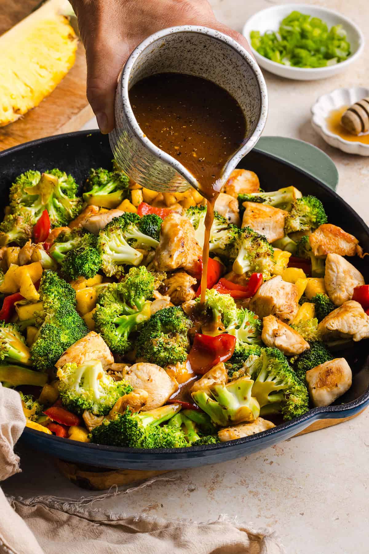 Skip the takeout with this Easy Pineapple Teriyaki Chicken Stir Fry! Made with juicy chicken, fresh pineapple, crisp veggies, and a healthy homemade teriyaki sauce in just 30 minutes.