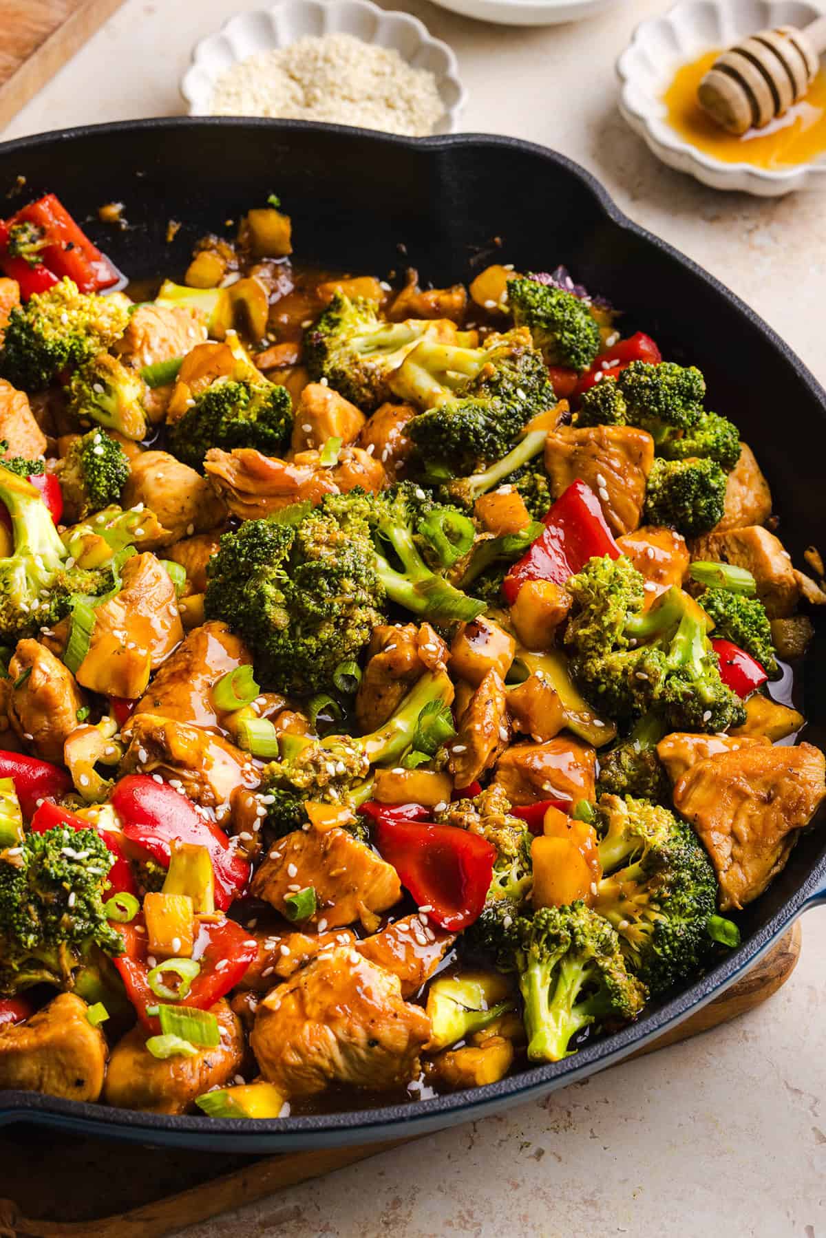 Skip the takeout with this Easy Pineapple Teriyaki Chicken Stir Fry! Made with juicy chicken, fresh pineapple, crisp veggies, and a healthy homemade teriyaki sauce in just 30 minutes.