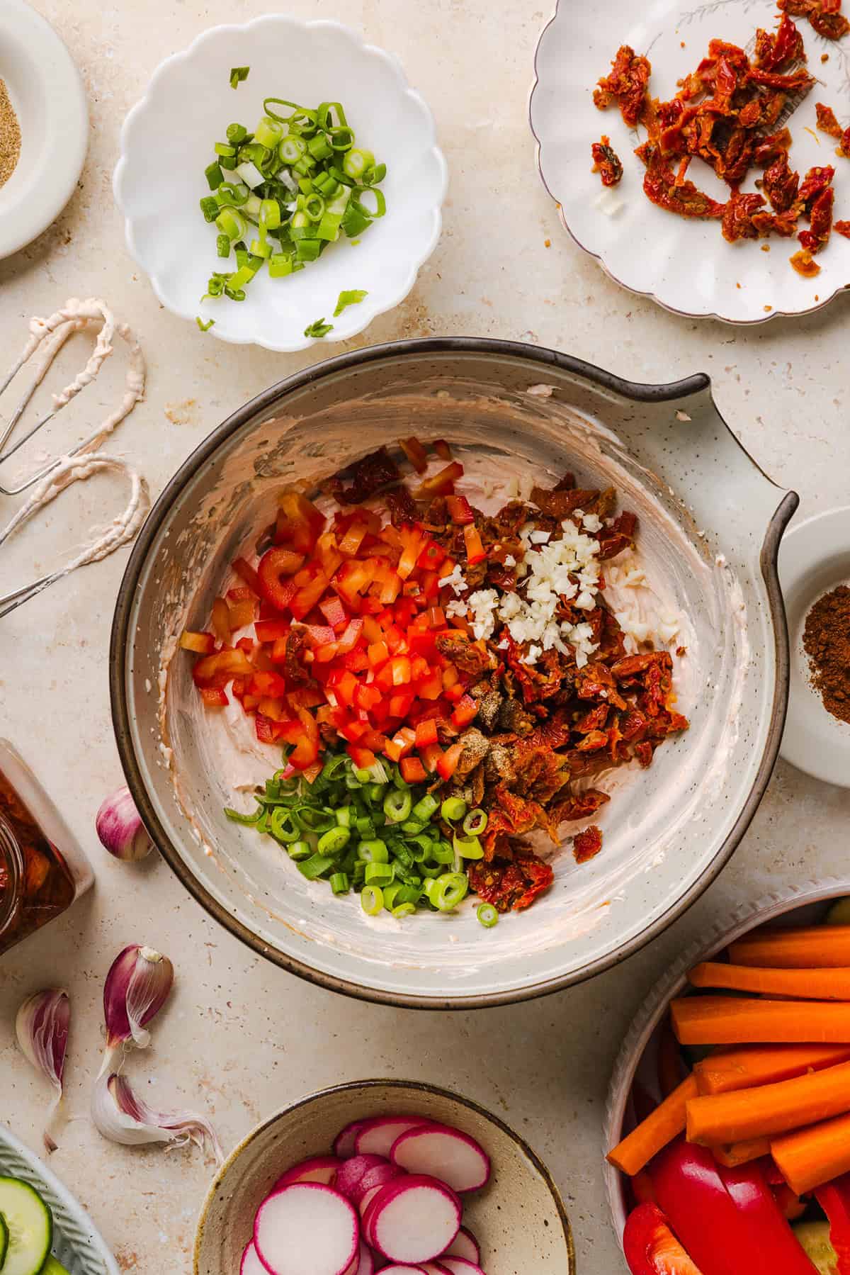 The BEST Creamy Sun-Dried Tomato Dip recipe made with protein-packed Greek yogurt, cream cheese, garlic, and bell peppers. Easy to make, perfect for parties, and ready in just minutes!