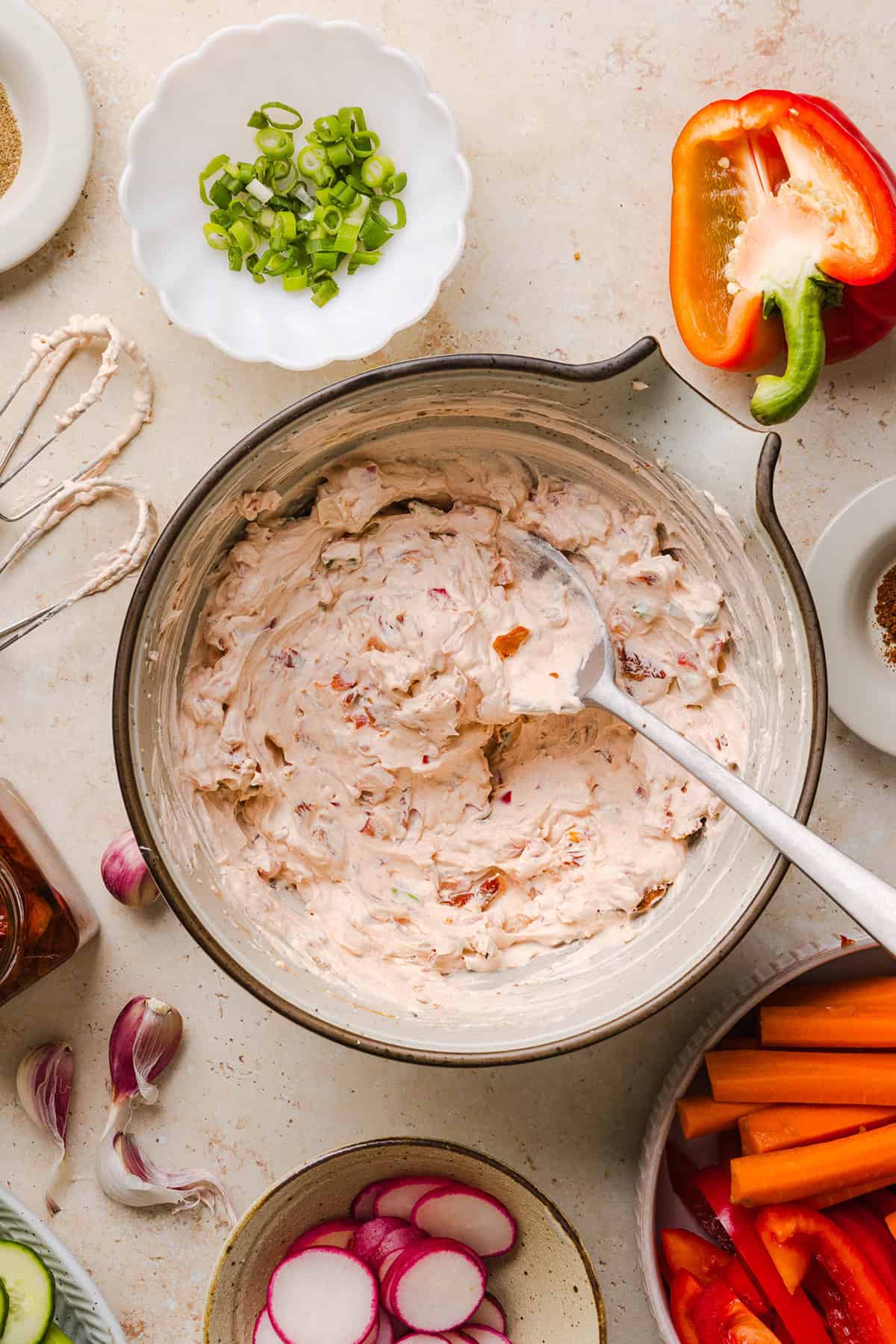 The BEST Creamy Sun-Dried Tomato Dip recipe made with protein-packed Greek yogurt, cream cheese, garlic, and bell peppers. Easy to make, perfect for parties, and ready in just minutes!