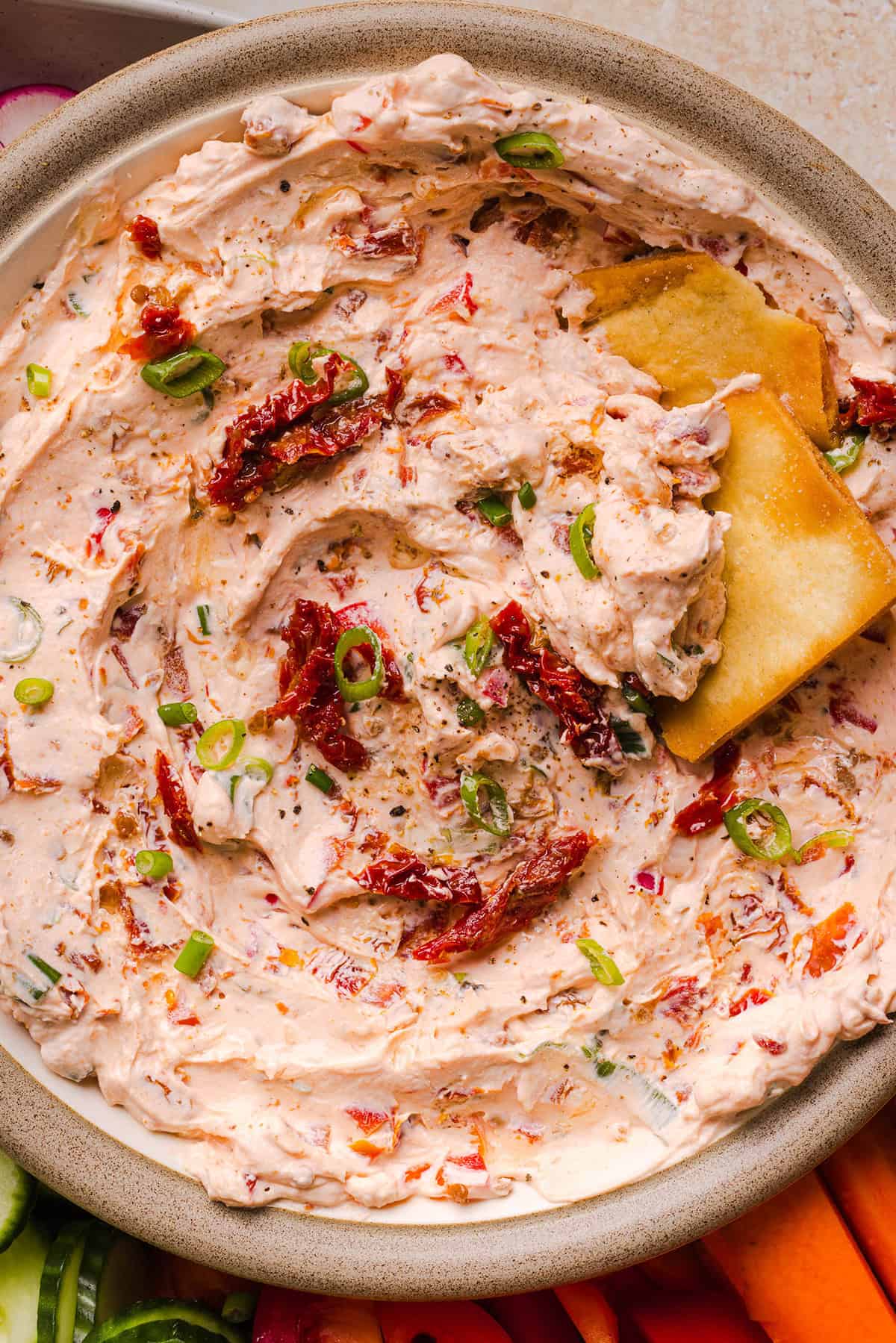 The BEST Creamy Sun-Dried Tomato Dip recipe made with protein-packed Greek yogurt, cream cheese, garlic, and bell peppers. Easy to make, perfect for parties, and ready in just minutes!