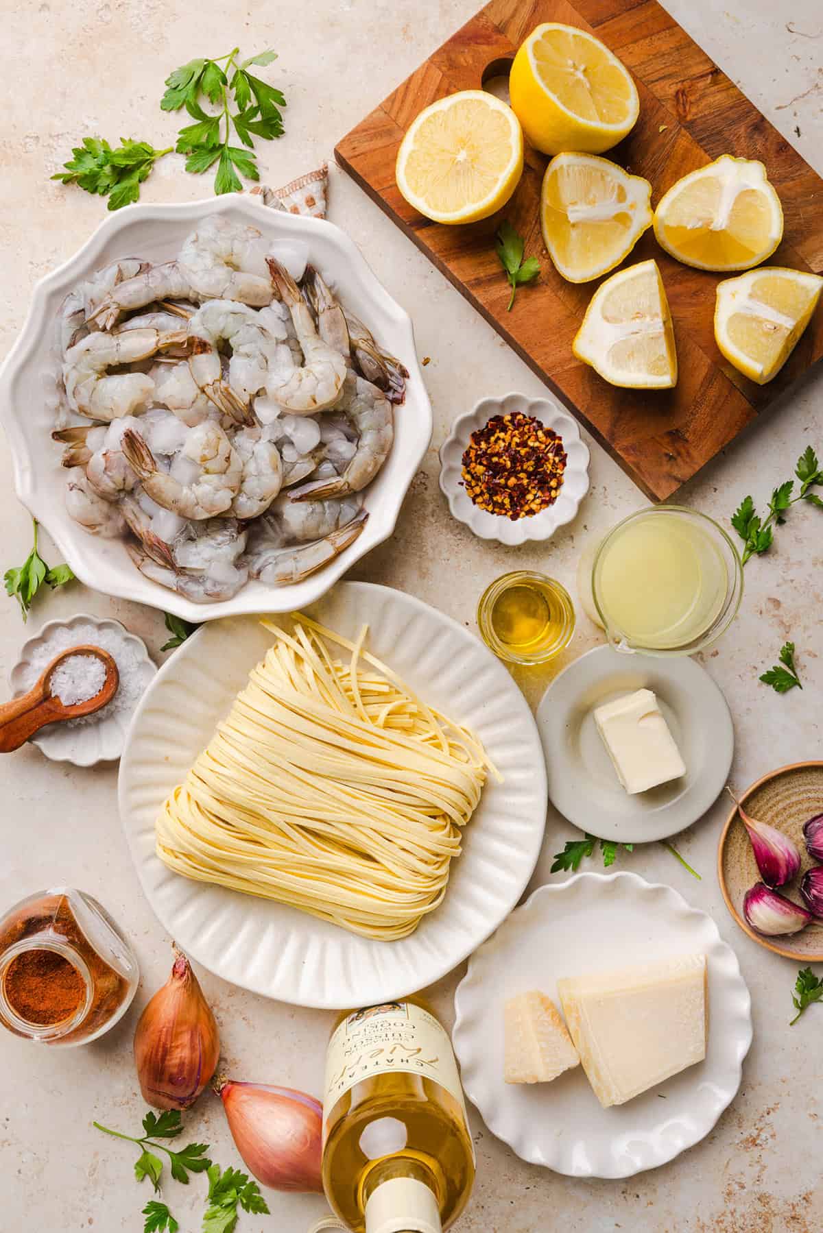 The BEST Healthy Shrimp Scampi recipe lightened up without sacrificing flavor! Juicy shrimp, garlic, lemon, white wine, and Parmesan are tossed with tender linguine in a silky, buttery sauce that’s ready in just 30 minutes.