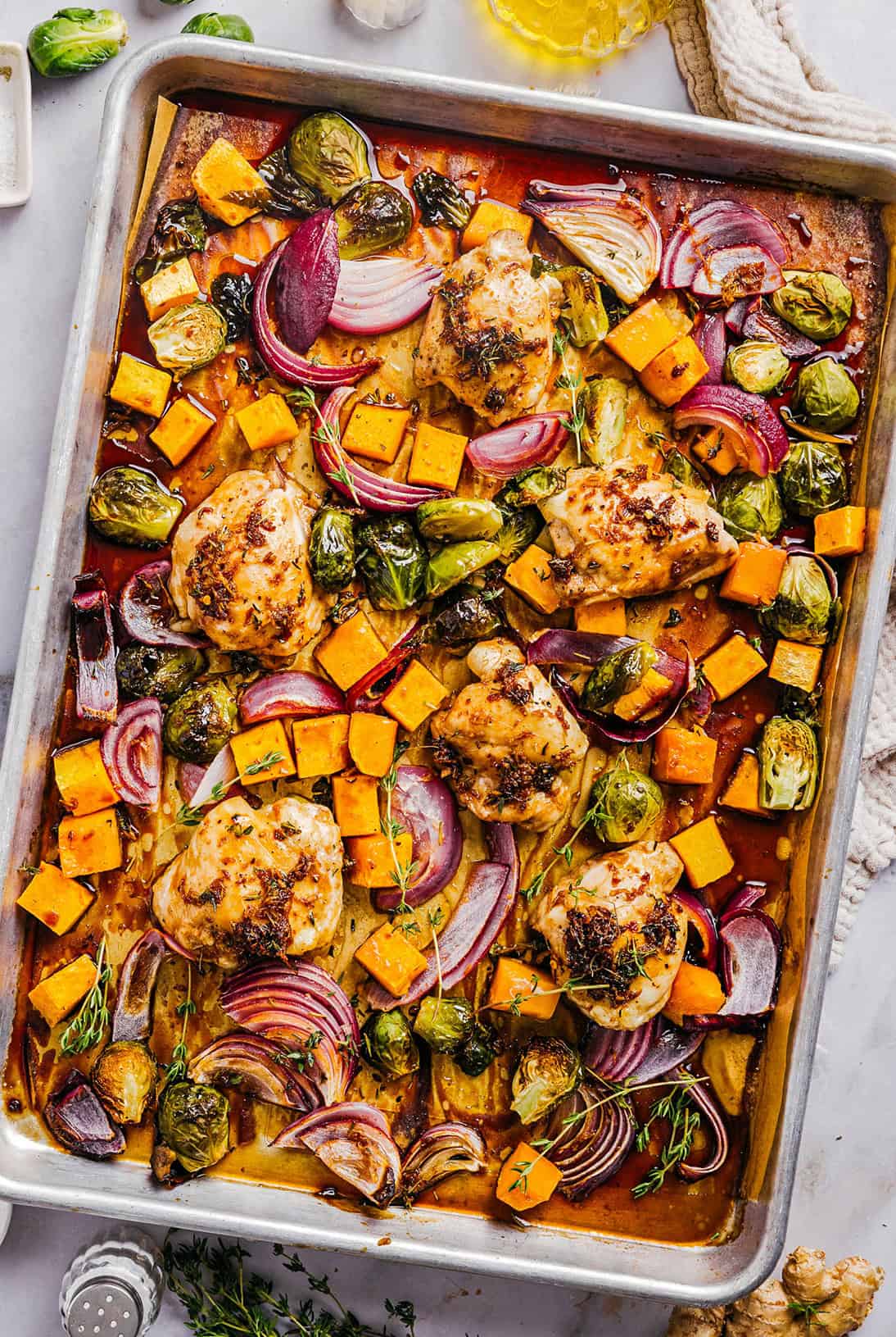 This Sheet Pan Maple Glazed Chicken with Vegetables is healthy, delicious and easily made all on one pan in just 30 minutes! The most flavorful weeknight dinner that is perfect for your fall meal prep!