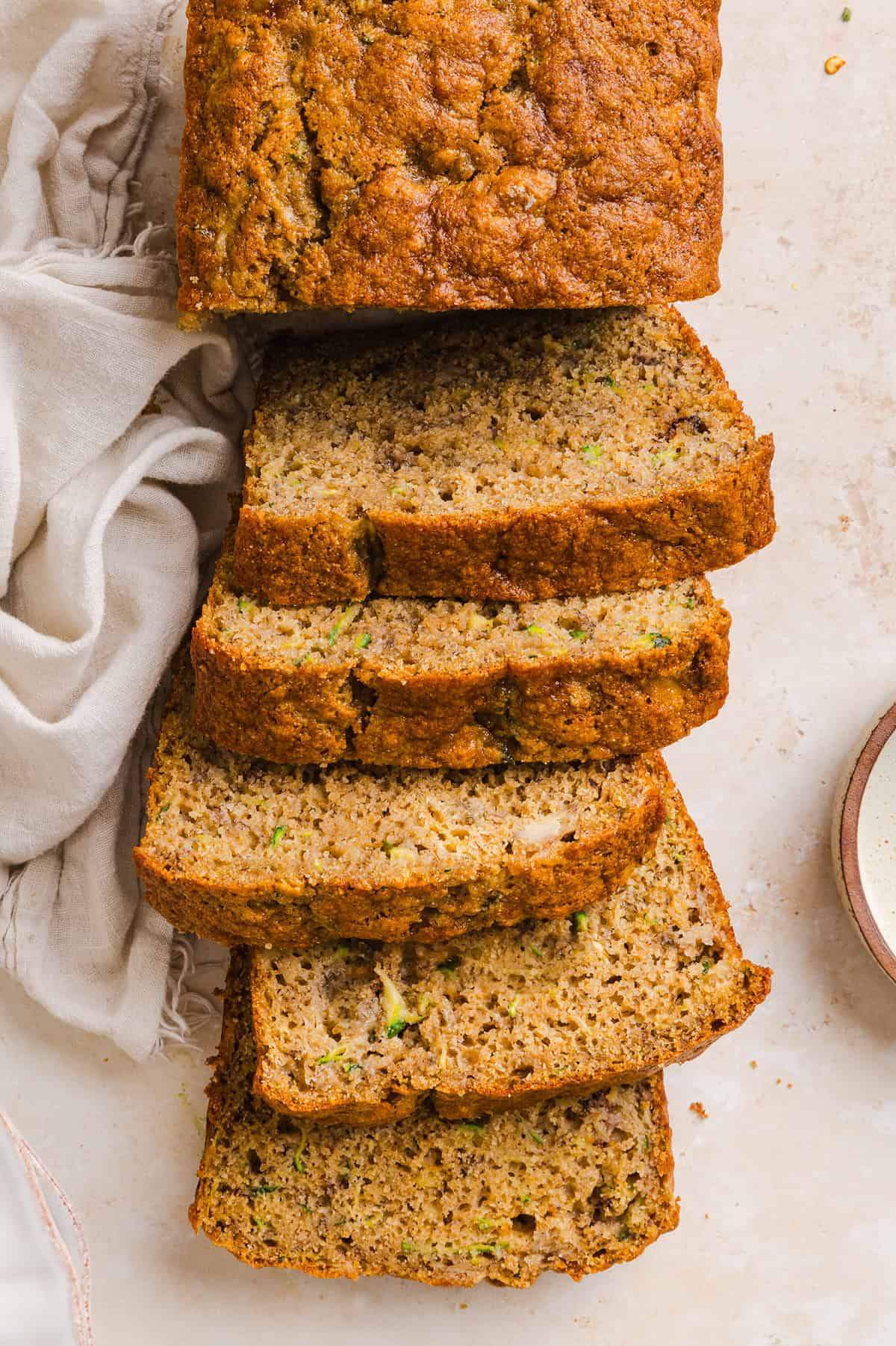 This Healthy Zucchini Banana Bread is soft, moist and perfectly sweet, made with ripe bananas, fresh zucchini and wholesome ingredients. Enjoy as an easy breakfast or nutritious snack!