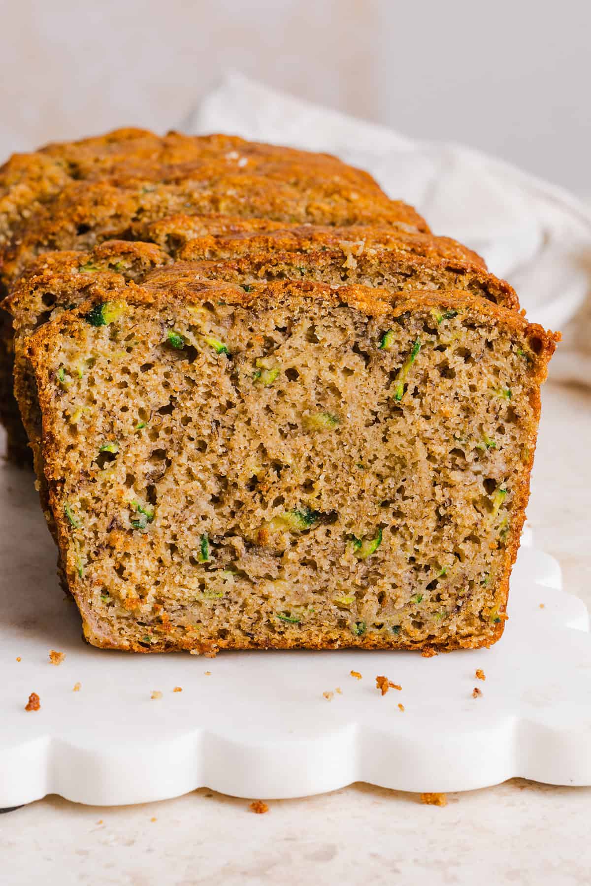 This Healthy Zucchini Banana Bread is soft, moist and perfectly sweet, made with ripe bananas, fresh zucchini and wholesome ingredients. Enjoy as an easy breakfast or nutritious snack!