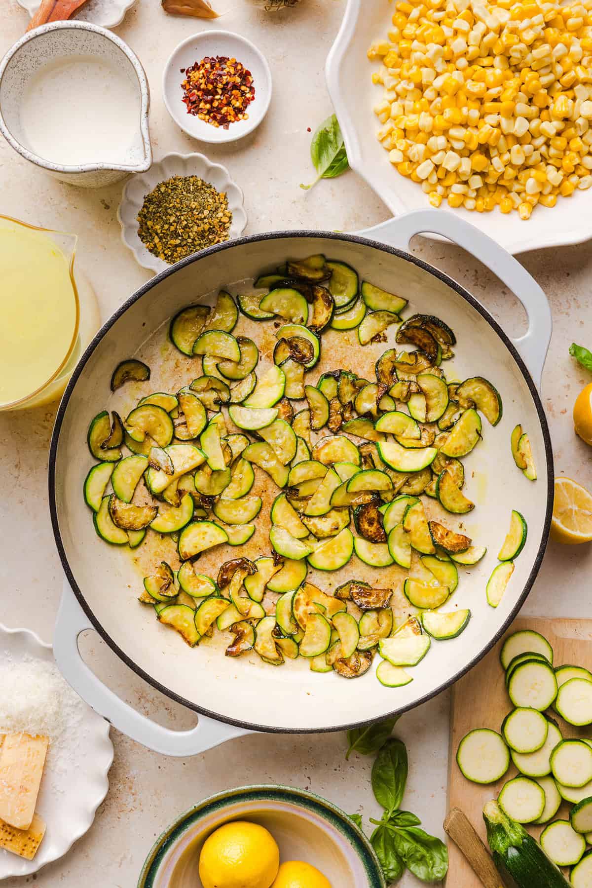 This creamy One Pan Lemon Garlic Orzo with Zucchini and Corn is fresh, flavorful and made in one skillet for an easy summer side dish or weeknight meal. Packed with fresh veggies, tender orzo, Parmesan, herbs and bright lemon flavor!