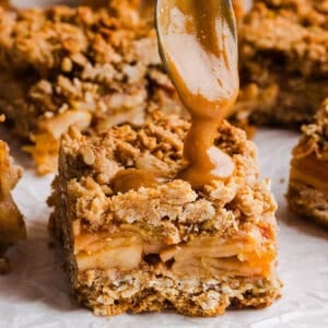 Healthy apple pie crumble bars drizzled with homemade salted caramel