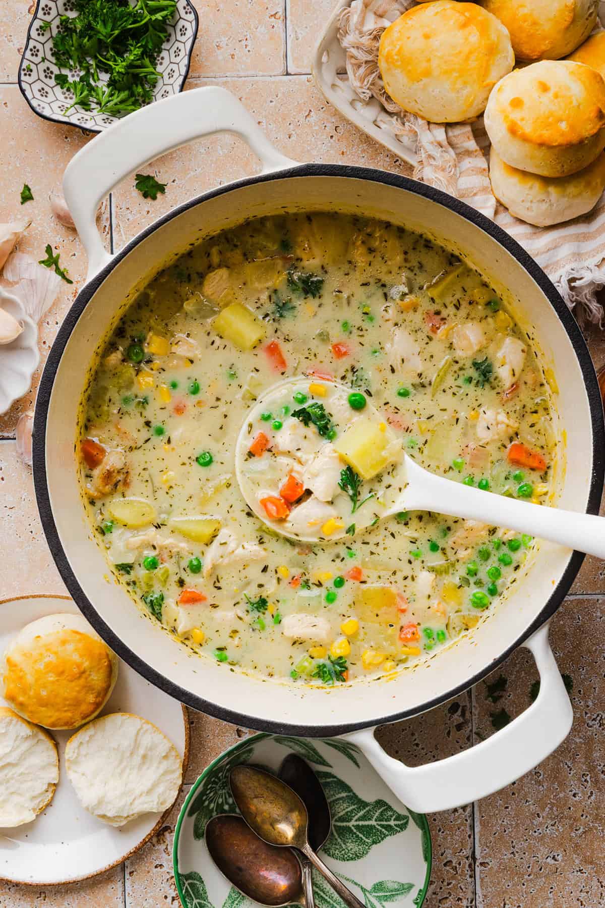 This Healthy Chicken Pot Pie Soup has all the cozy flavors of classic chicken pot pie in an easy, one-pot dinner! It’s loaded with tender chicken, potatoes, carrots, peas and corn in a creamy, herb-seasoned broth made without heavy cream.