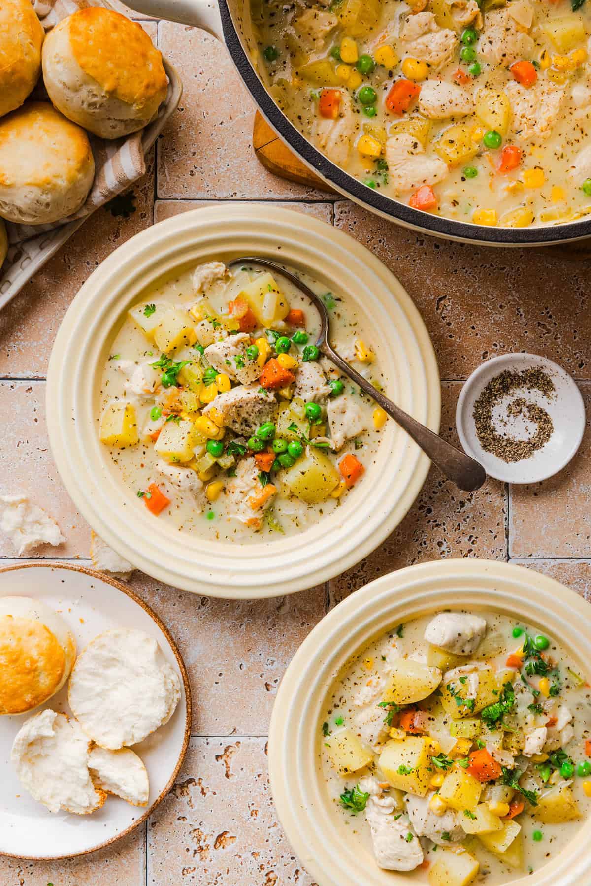 This Healthy Chicken Pot Pie Soup has all the cozy flavors of classic chicken pot pie in an easy, one-pot dinner! It’s loaded with tender chicken, potatoes, carrots, peas and corn in a creamy, herb-seasoned broth made without heavy cream.